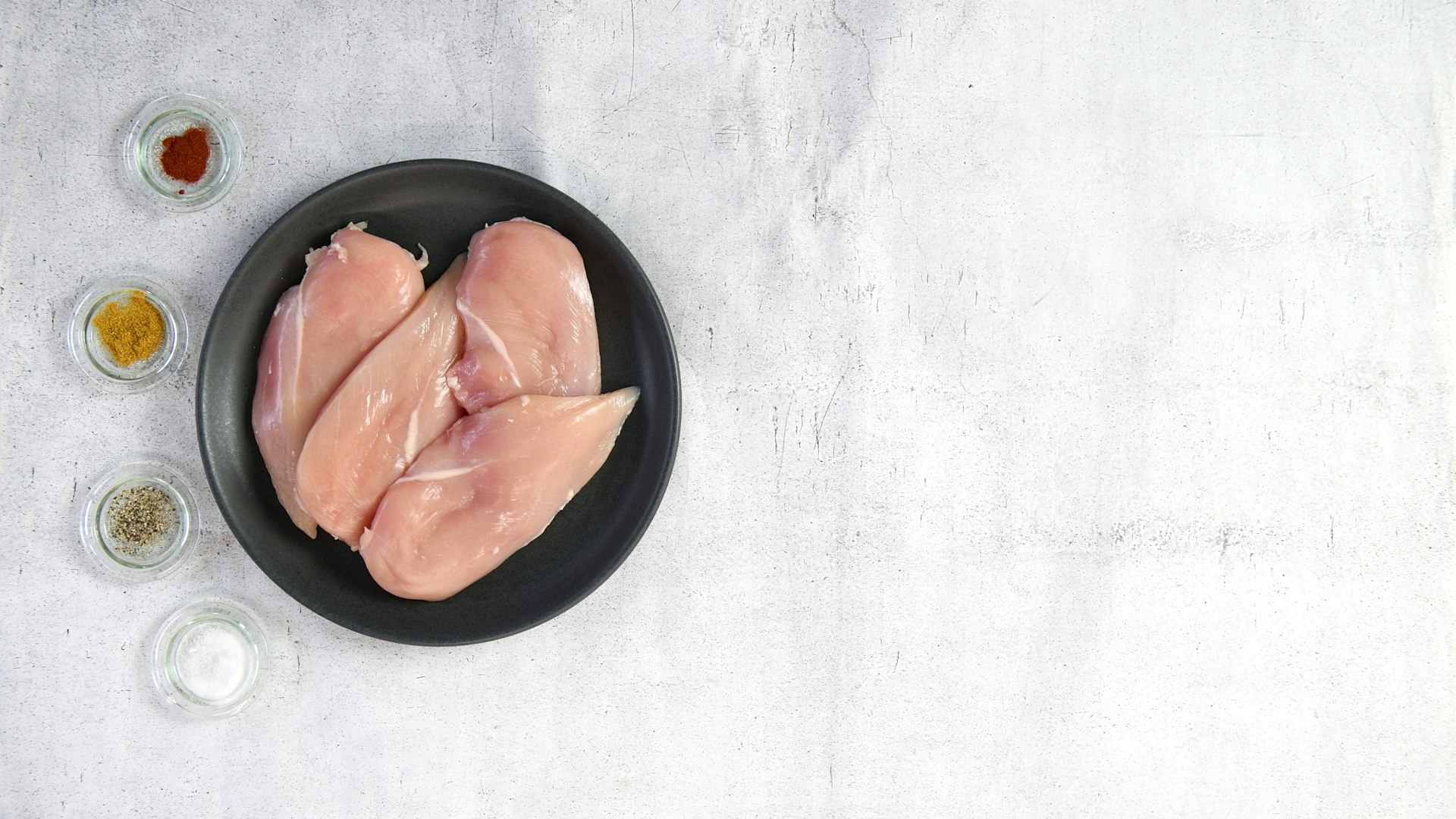 Frozen IQF boneless skinless chicken thighs — individually quick frozen pieces
