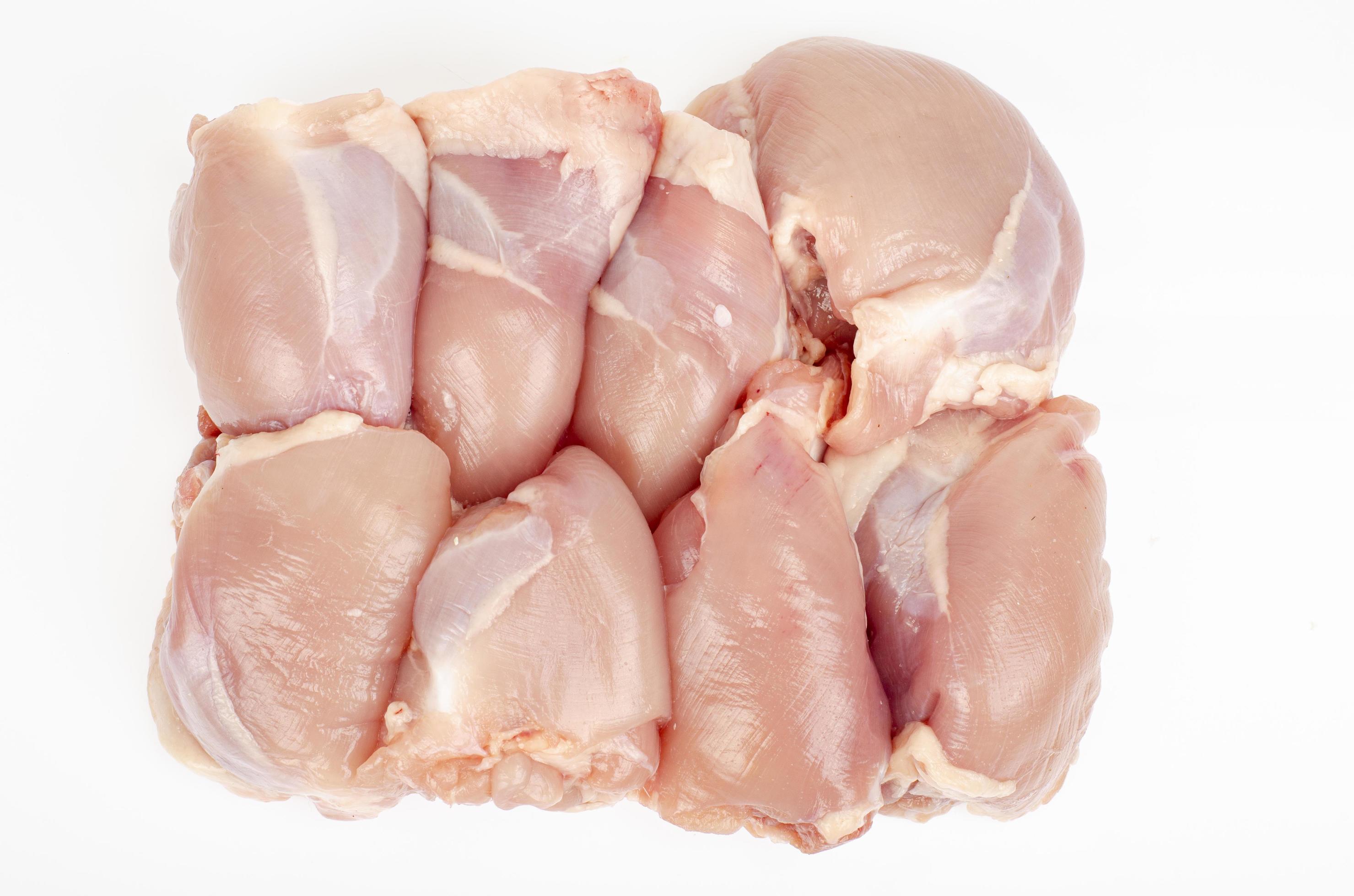 Raw boneless skinless chicken thigh fillets — premium Brazilian poultry
